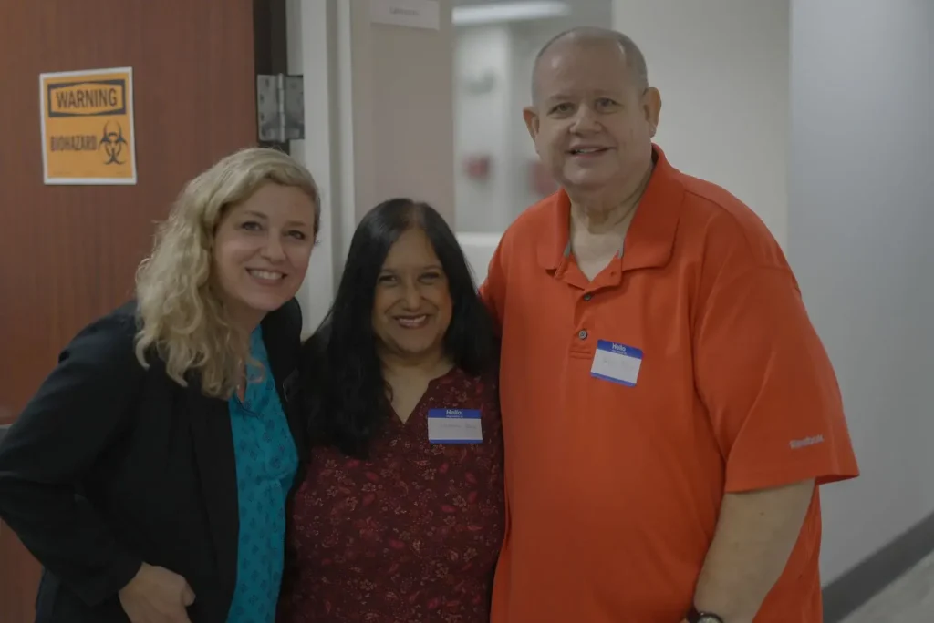 two women with old man