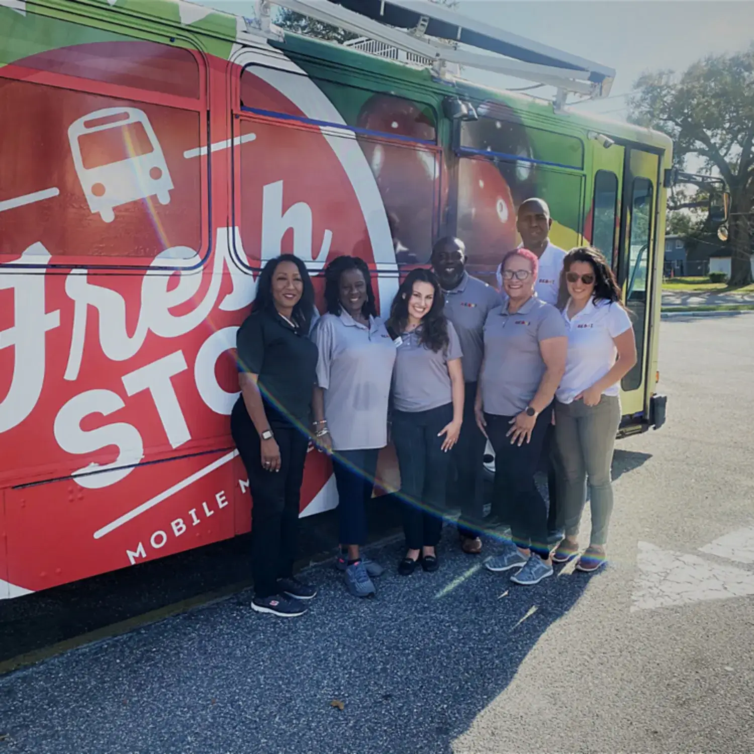 Hebni Team Members Standing Near Vehicle