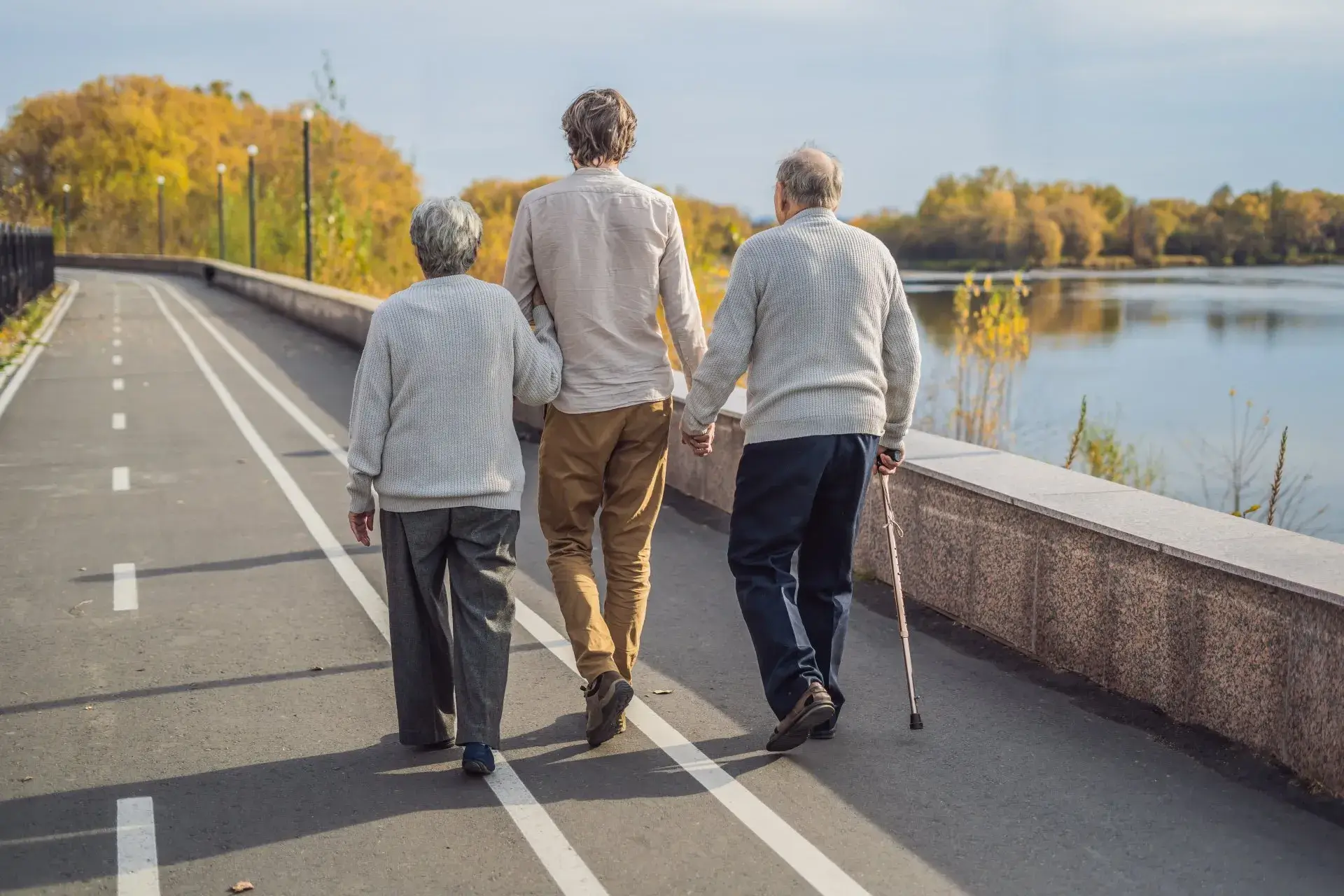 Three Old Man Walking on Bridge